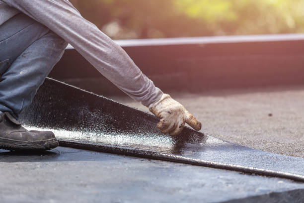 Professional Basement Waterproofing technician working in Franklin, VA
